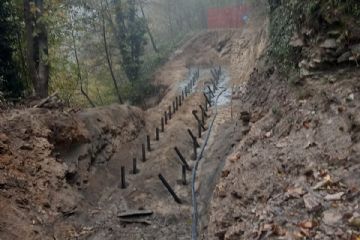 Intervento di messa in sicurezza del versante con micropali e scogliera a valle di Strada Cuccia